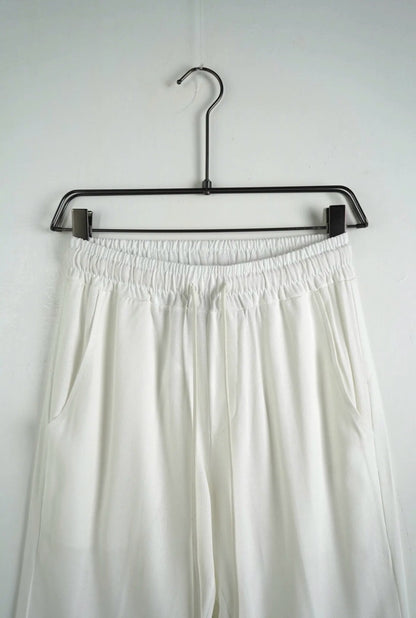 Pantalone panna in misto lino con elastico e laccio in vita
