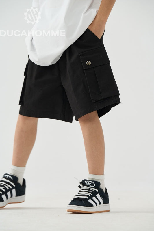 Jeans bermuda cargo nero con tasche laterali e laccio lungo 10-16 anni