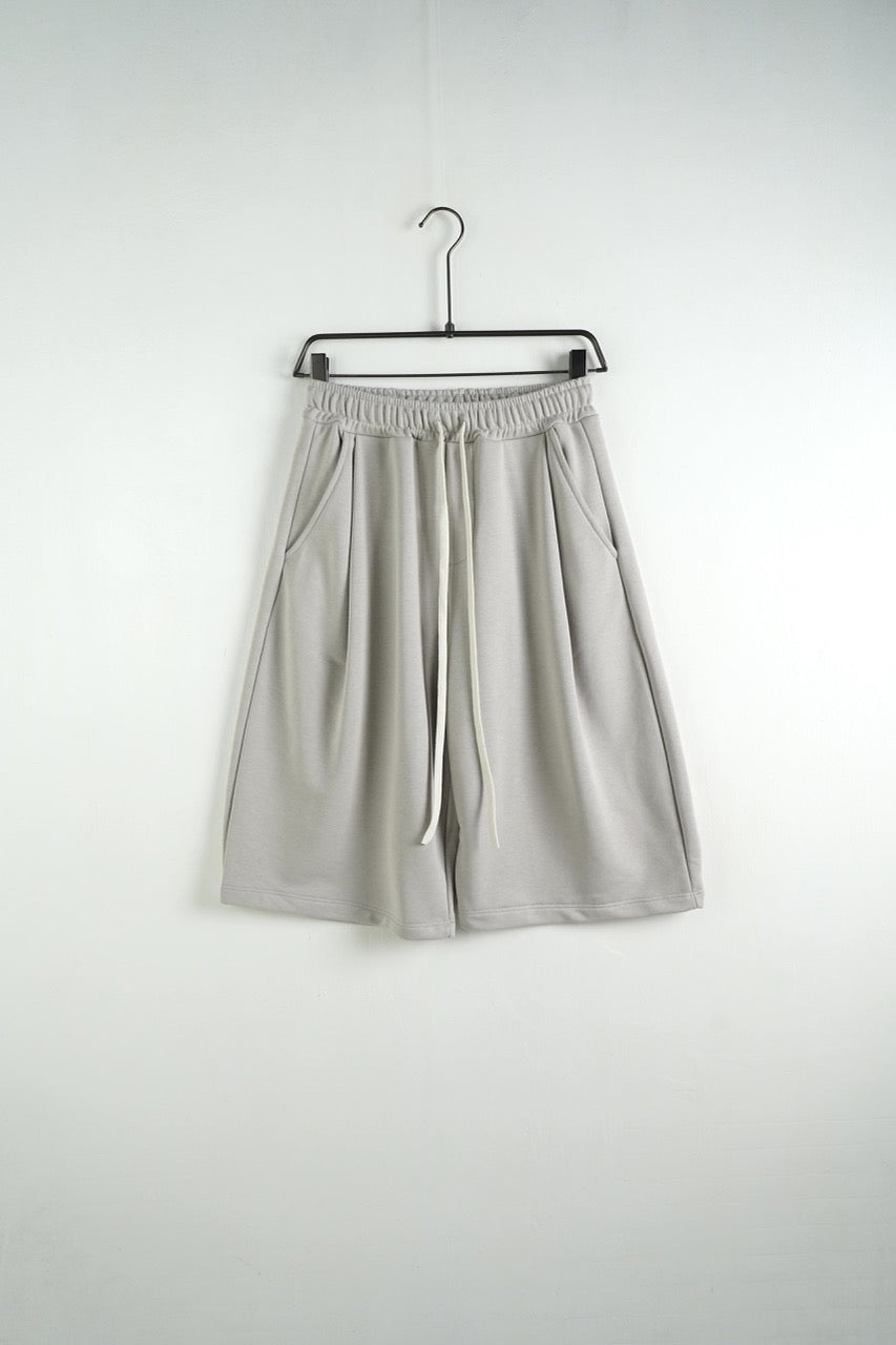 Bermuda uomo grigio chiaro balloon fit in tinta unita