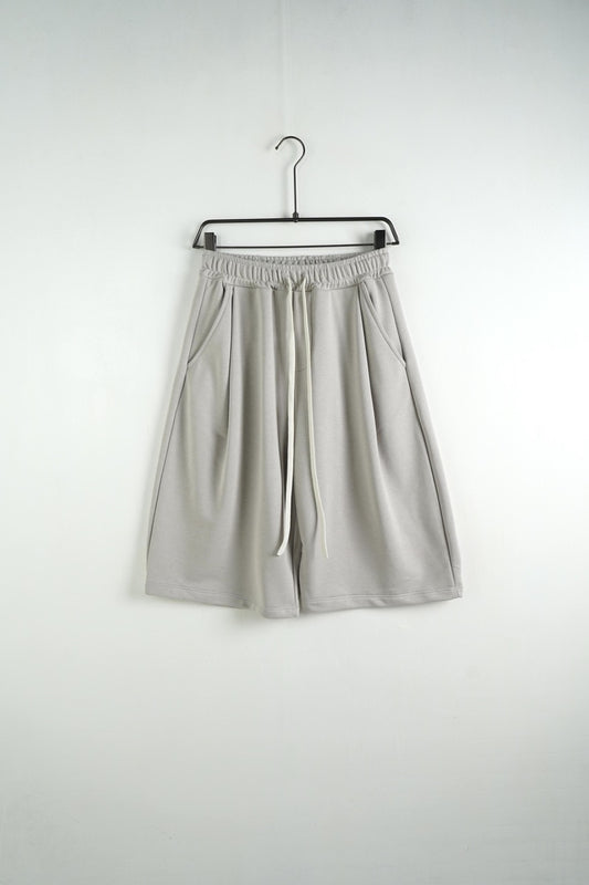 Bermuda uomo grigio chiaro balloon fit in tinta unita