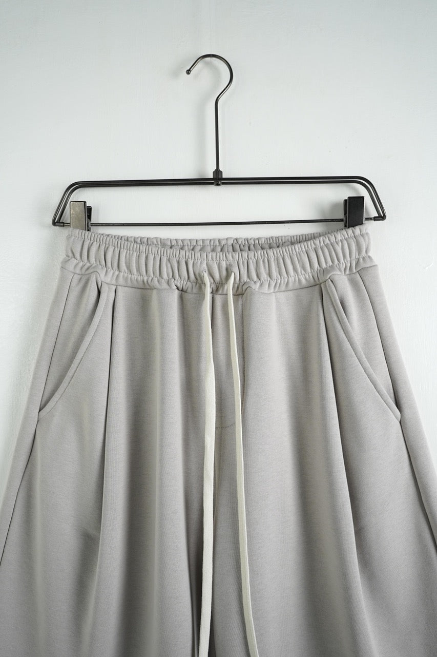 Bermuda uomo grigio chiaro balloon fit in tinta unita