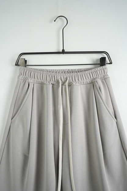 Bermuda uomo grigio chiaro balloon fit in tinta unita