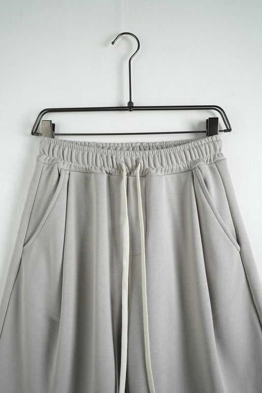 Bermuda uomo grigio chiaro balloon fit in tinta unita