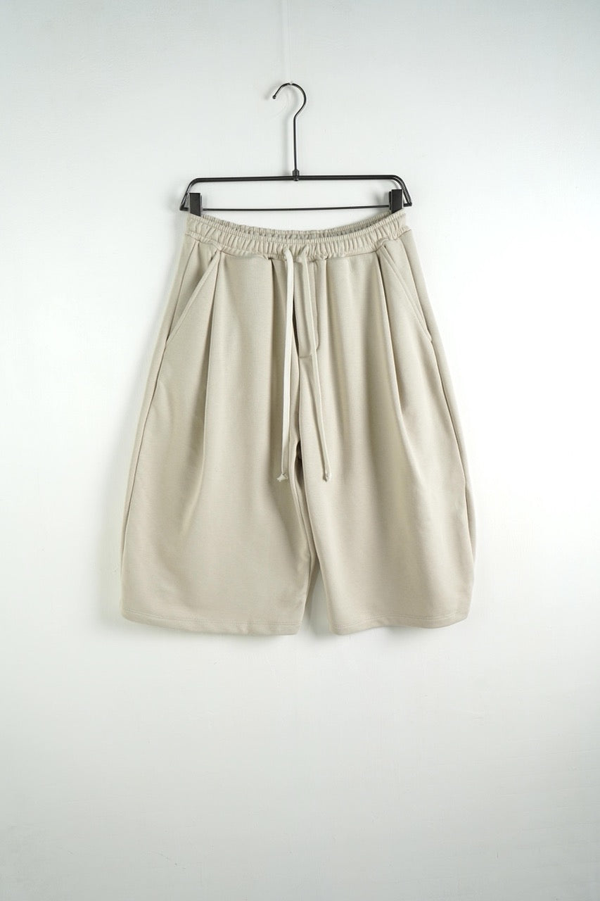 Bermuda uomo beige balloon fit in tinta unita