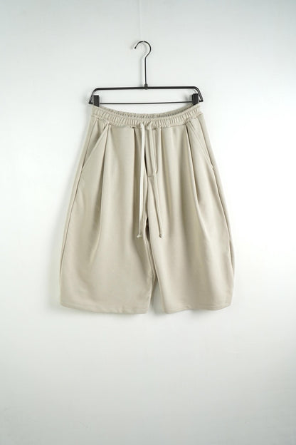 Bermuda uomo beige balloon fit in tinta unita