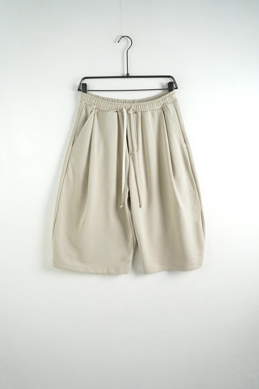 Bermuda uomo beige balloon fit in tinta unita