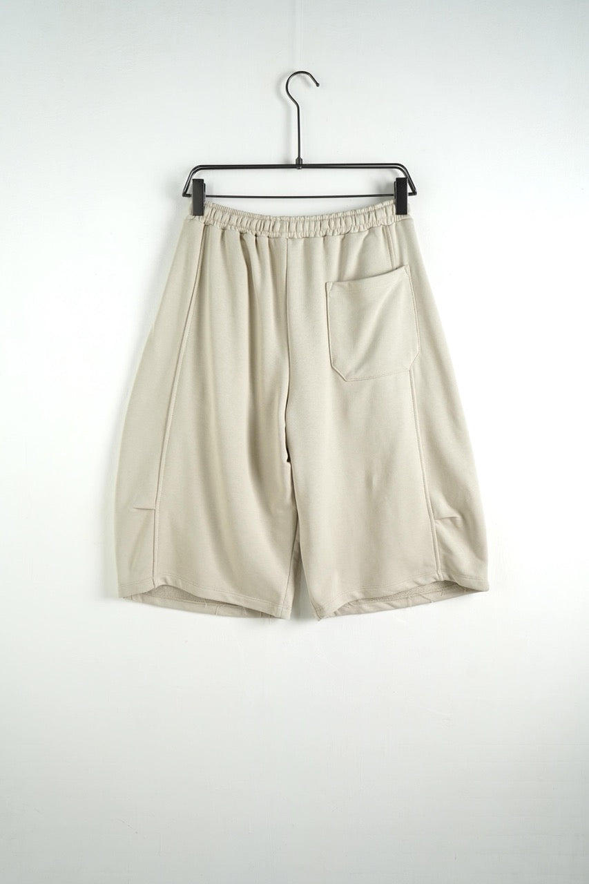 Bermuda uomo beige balloon fit in tinta unita