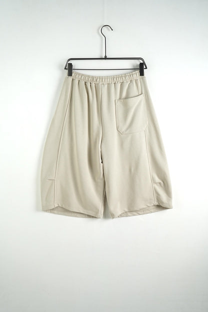 Bermuda uomo beige balloon fit in tinta unita