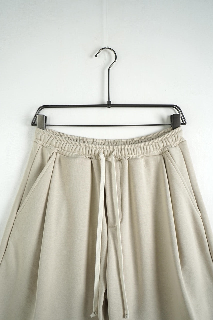 Bermuda uomo beige balloon fit in tinta unita