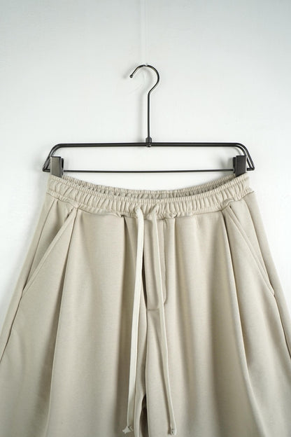 Bermuda uomo beige balloon fit in tinta unita