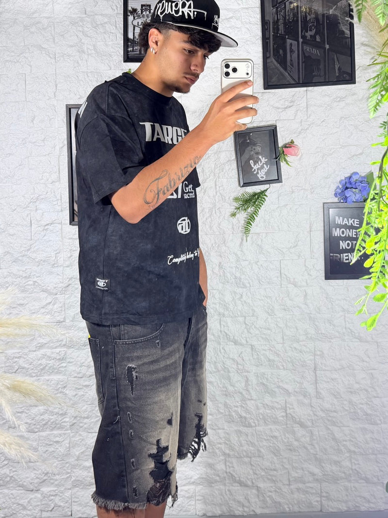 Jeans bermuda nero slavato con strappi e fondo sfrangiato