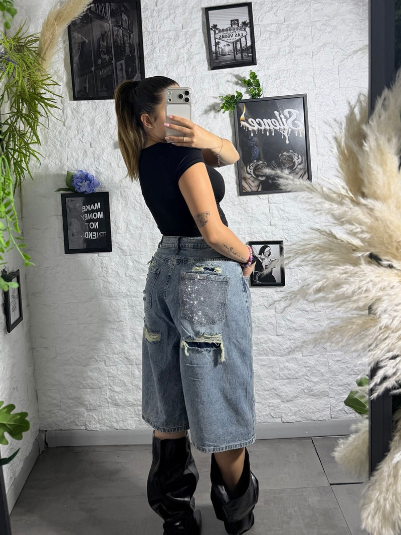 Jeans jort denim chiaro con tasca argento brillantinata