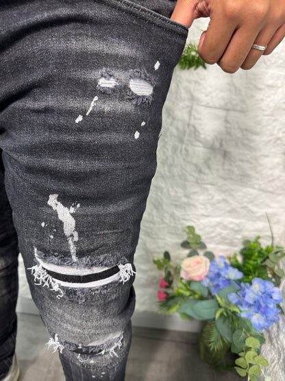 Jeans skinny grigio slavato in denim con schizzi di vernice - MOD "DSQ"
