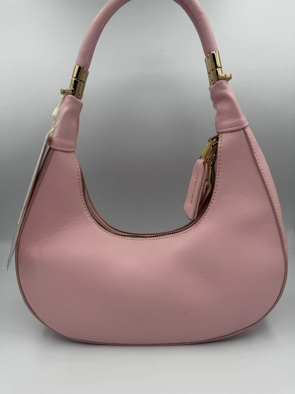 Borsa rosa cipria in ecopelle con manico imbottito e tracolla