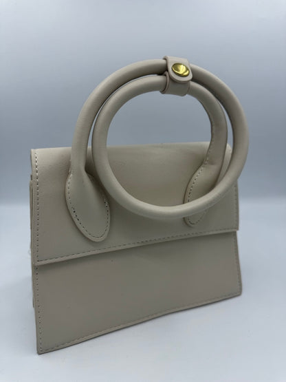 Borsa panna a mano in ecopelle con manico circolare imbottito