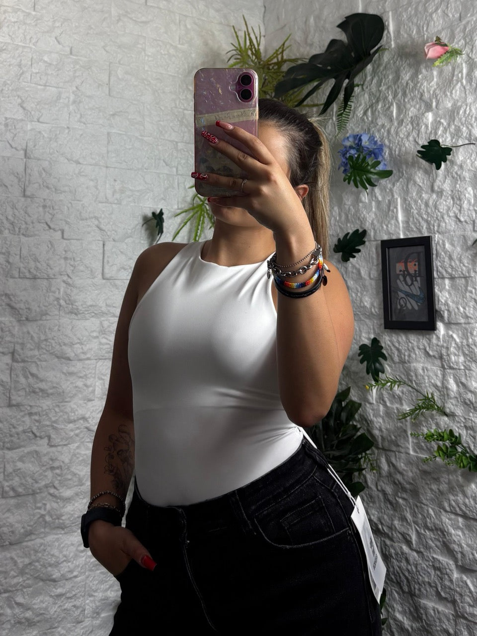 Body in lycra smanicato in tinta unita con scollo alto