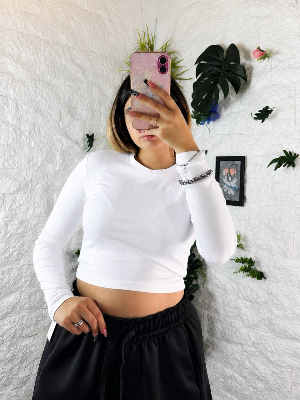 T-shirt crop top in tinta unita a manica lunga