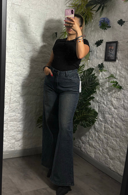 Jeans blu scuro in denim palazzo con animalier e brillantini