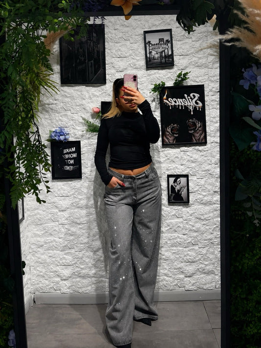 Jeans grigio slavato in denim wide leg con strass