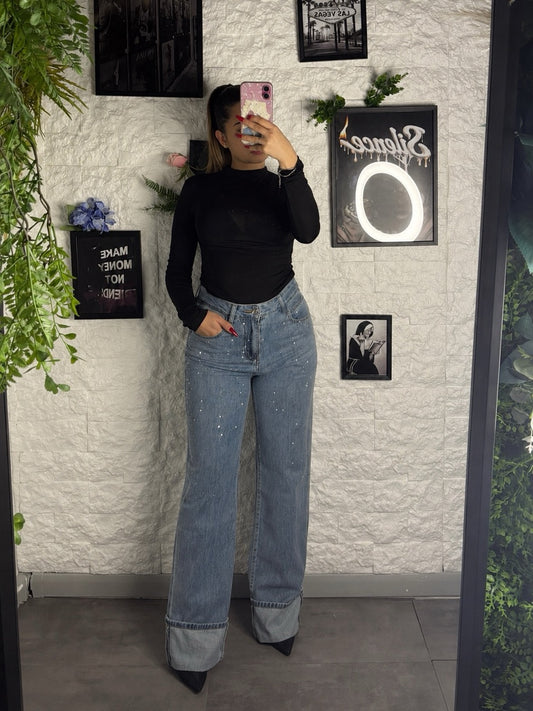 Jeans azzurro medio slavato in denim a palazzo con strass e risvolto
