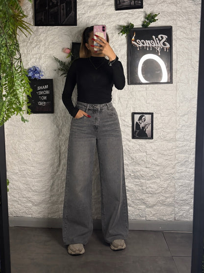 Jeans grigio slavato in denim a palazzo