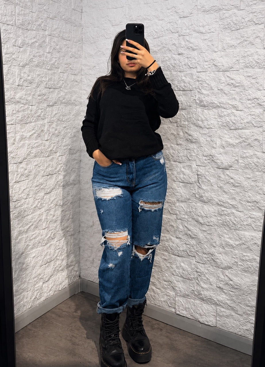 Jeans blu scuro in denim con strappi effetto rovinato