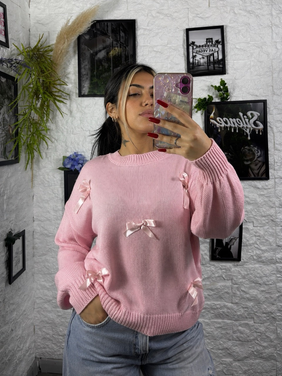 Maglioncino in maglia con fiocchetti in raso applicati