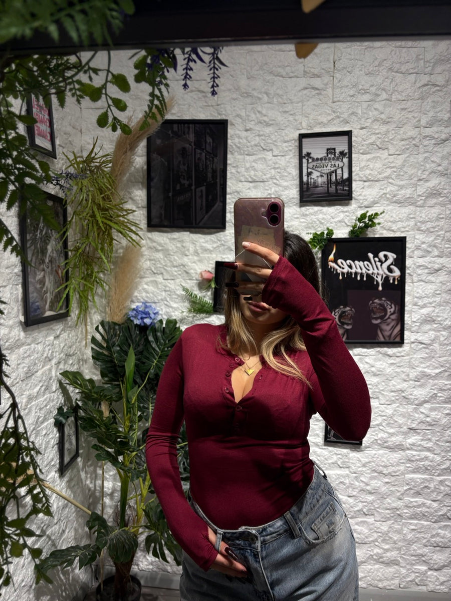 Body leggero in tinta unita con scollo polo e maniche a guanto