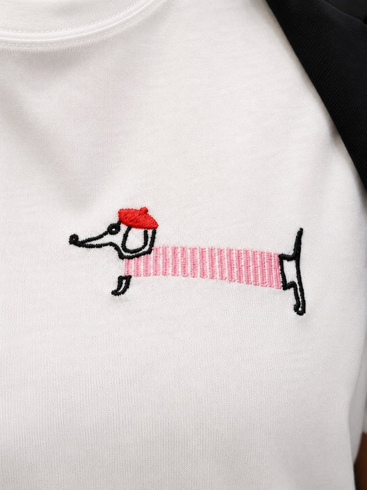 T-shirt bianca con ricamo bassotto