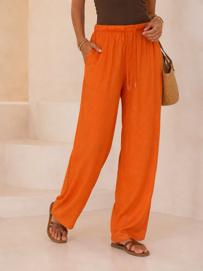 Pantalone palazzo effetto satinato con elastico e laccio