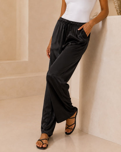 Pantalone palazzo effetto satinato con elastico e laccio