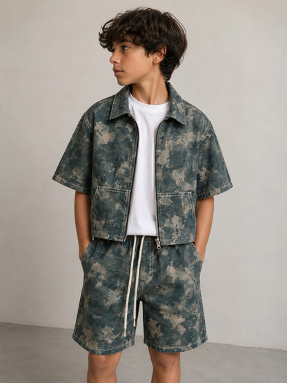 Completo verde camouflage con camicia zip e bermuda 10-16 anni