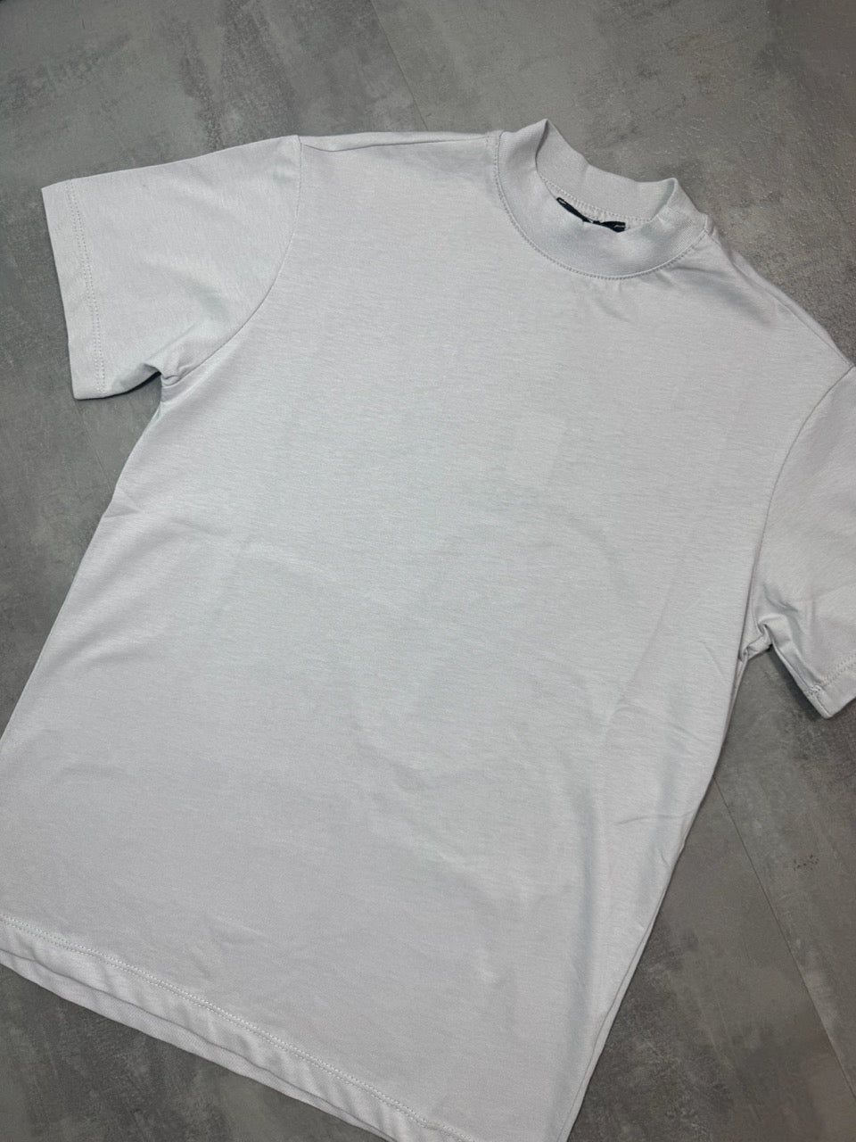 T-shirt ghiaccio in tinta unita con mezzo collo alto 10-16 anni