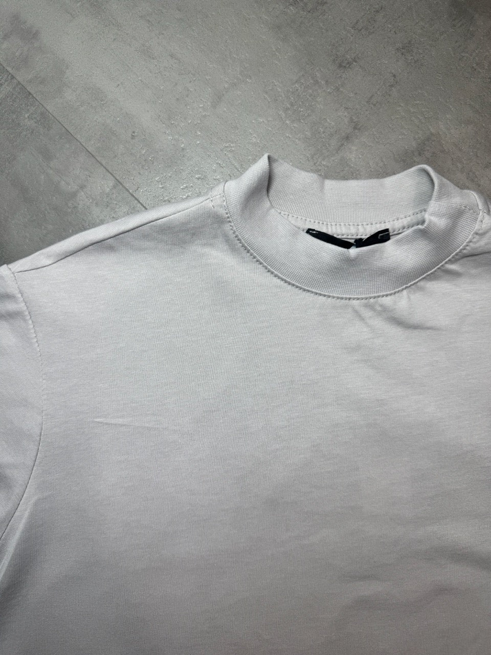 T-shirt ghiaccio in tinta unita con mezzo collo alto 10-16 anni