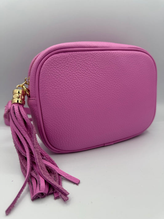 Borsa in ecopelle tinta unita con nappina laterale