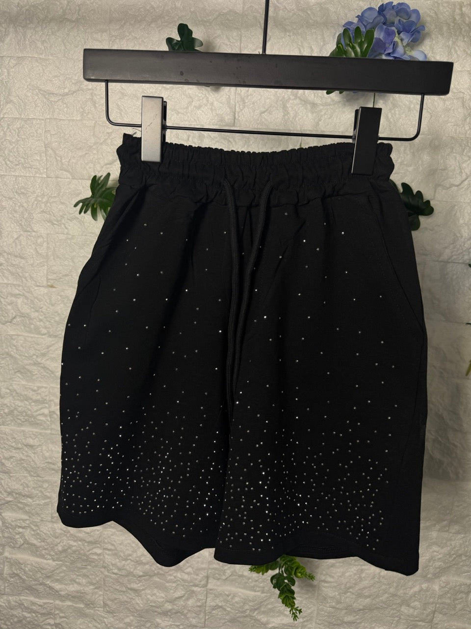 Pantaloncino nero in cotone con brillantini
