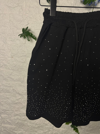 Pantaloncino nero in cotone con brillantini