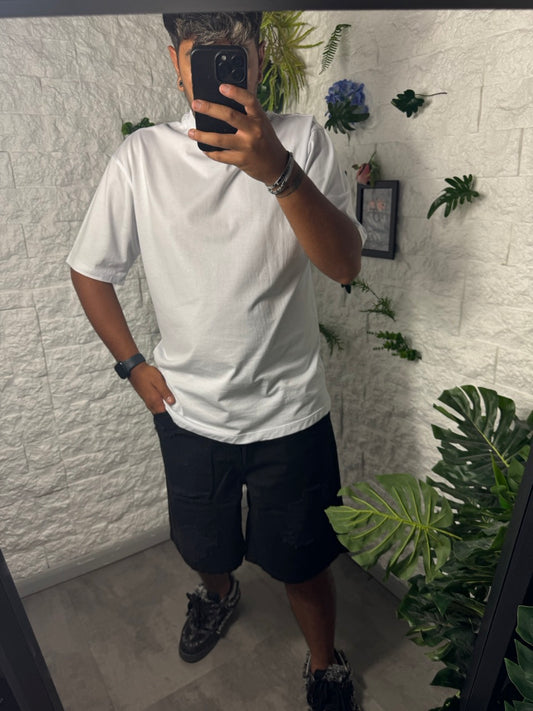 Jeans regular fit neri con strappi