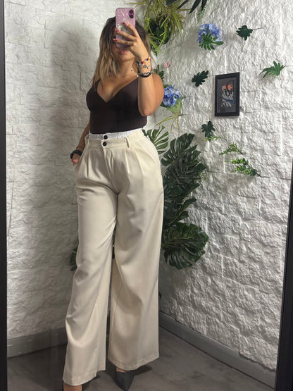 Pantalone a palazzo con pences e dettaglio in vita a effetto doppio