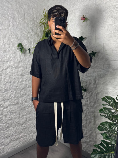 Completo nero in simil lino con polo e pantaloncino coordinato