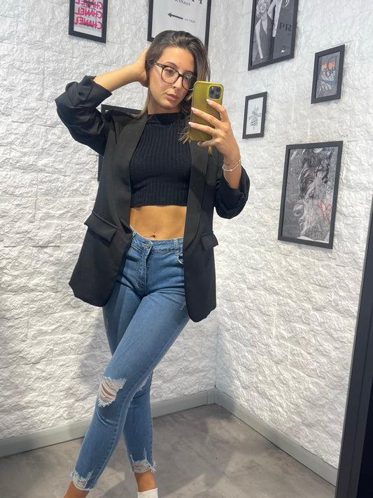 Jeans blu denim skinny con strappi su ginocchia e fondo